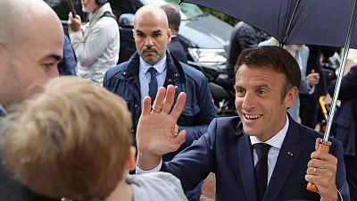 We can find a new majority, Macron says after losing control of parliament