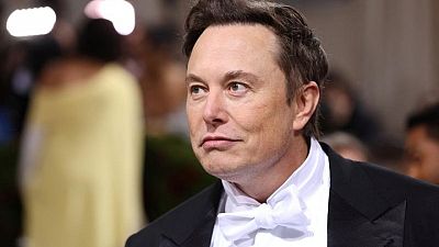 Anticipating US downturn, Elon Musk details Tesla staff cuts