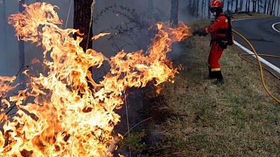 Spanish firefighters on alert after huge wildfire tamed