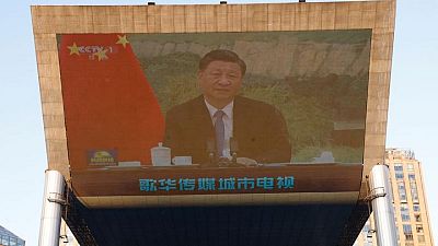 Xi insta a la unidad mundial para respaldar la recuperación económica y critica sanciones