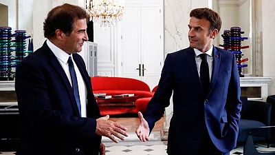 Analysis-Macron needs to turn foes into friends and woo conservatives