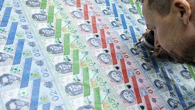 Crises keep demand for cash high, banknote machine company says