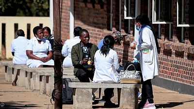 Zimbabwe healthcare workers temporarily call off wage strike