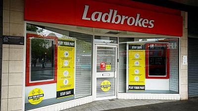 Ladbrokes owner Entain accelerates plan to exit unregulated markets