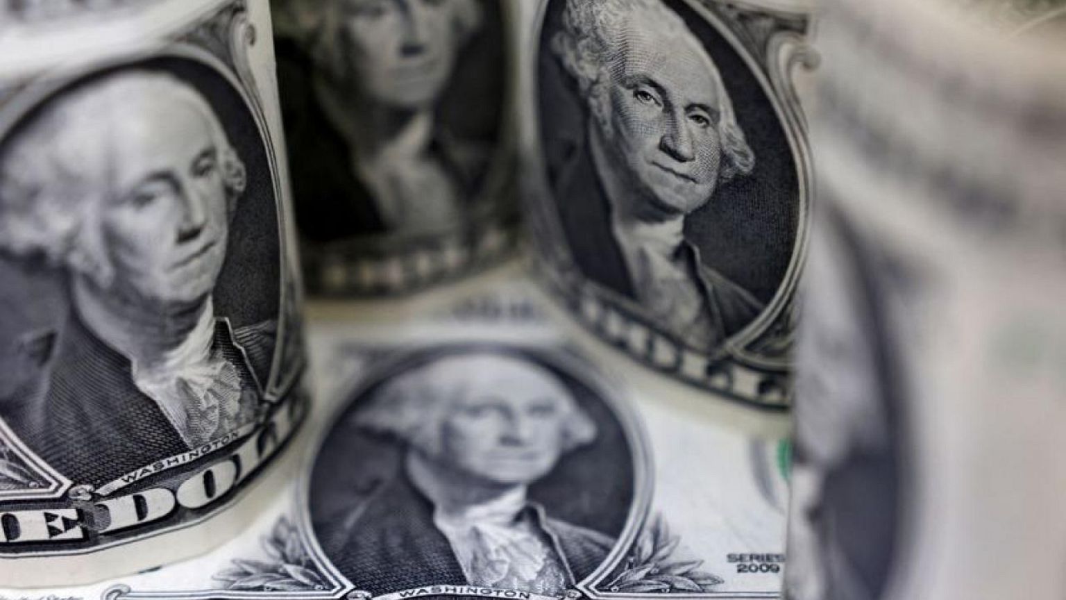 Dollar dives as investors cheer after U.S. inflation misses forecasts