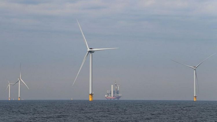 Dutch build out North Sea wind farms, test floating solar panels