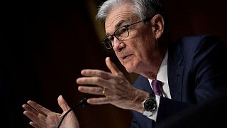 World stocks steady, dollar ticks up on Powell-watch
