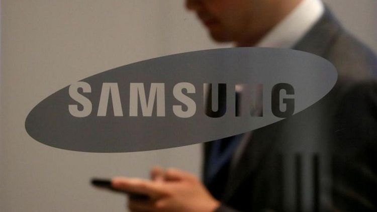 Samsung Elec to expand chip production at largest plant next year - media