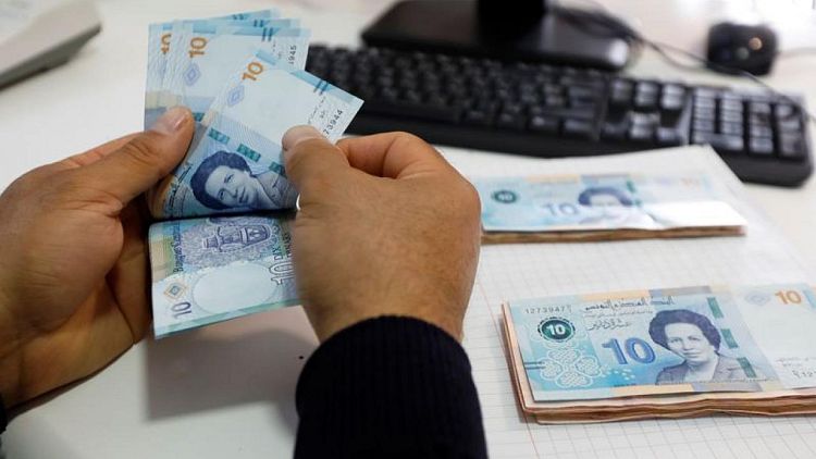 الدينار التونسي يتراجع لمستوى قياسي جديد مقابل الدولار