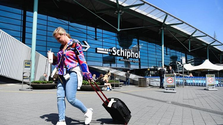 Schiphol airport reducing daily passenger flow by 18%