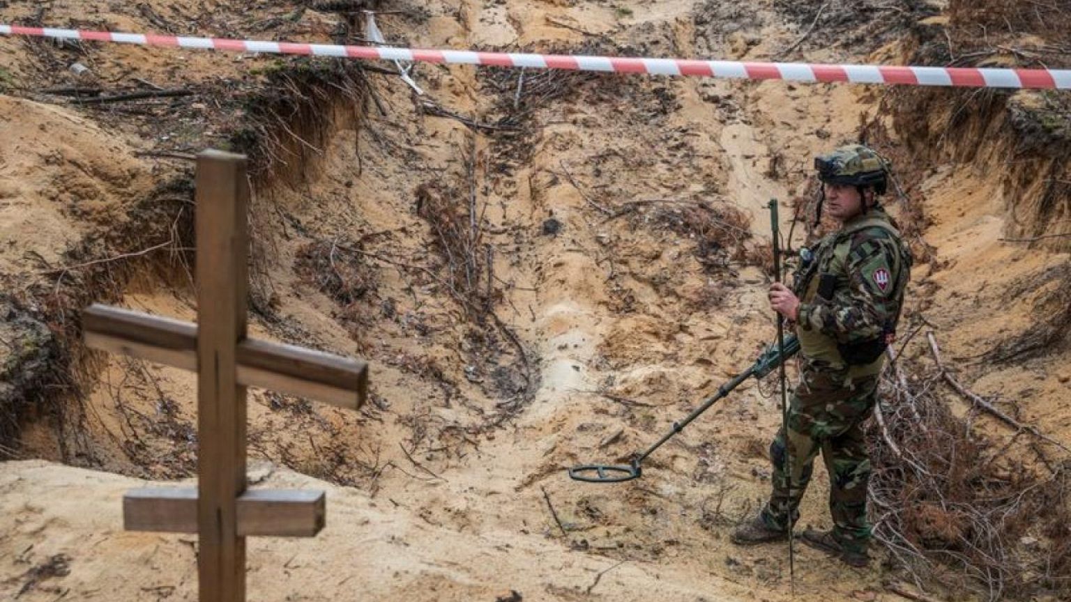 Most people buried in mass grave in Ukraine's Izium are civilians - police chief