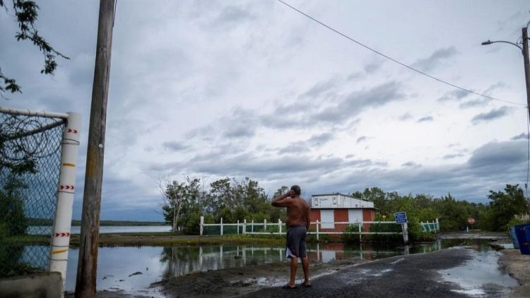 Hurricane Fiona blows toward Puerto Rico, knocking out power to many