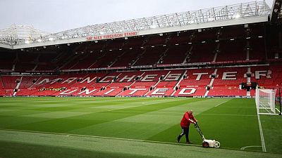 Man United reinstates forecast after quarterly loss narrows