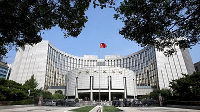 El banco central de China dice que impulsará con firmeza y prudencia la internacionalización del yuan