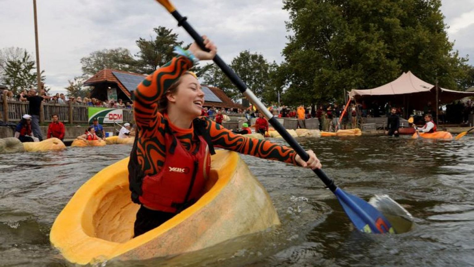 Paddle your own pumpkin: racers descend on Belgian pond
