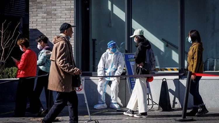 الصين تسجل 1407 إصابات جديدة بفيروس كورونا