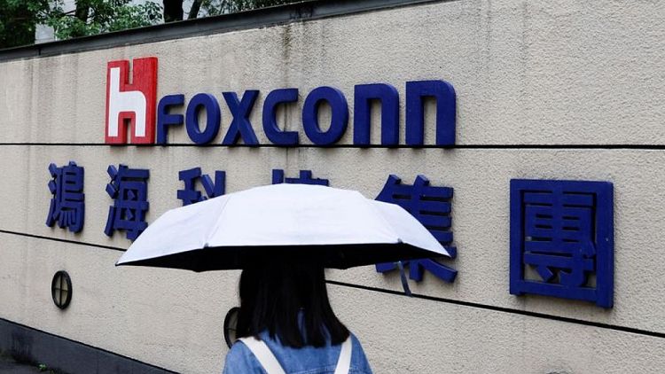 China's COVID resurgence spurs new curbs, Foxconn imposes restrictions