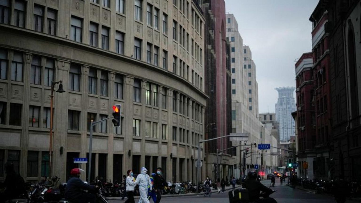 Residents cheer after China eases some COVID curbs