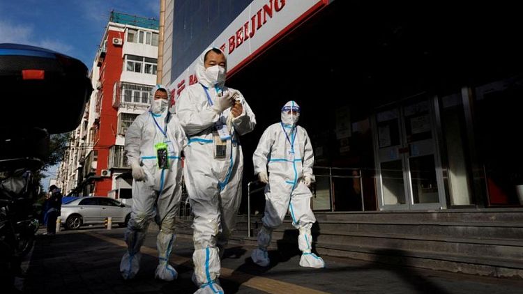 Pekín y otras ciudades chinas registran un récord de casos de COVID-19