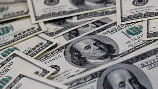 Dollar gains with bond yields up, Fed in focus