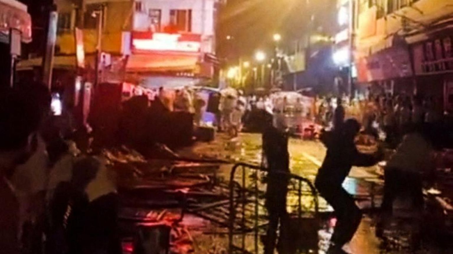 Two Chinese cities ease COVID curbs after protests spread