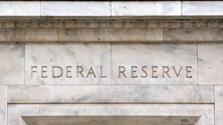 Funcionarios Fed ven tasas de interés más altas y por mayor lapso de tiempo