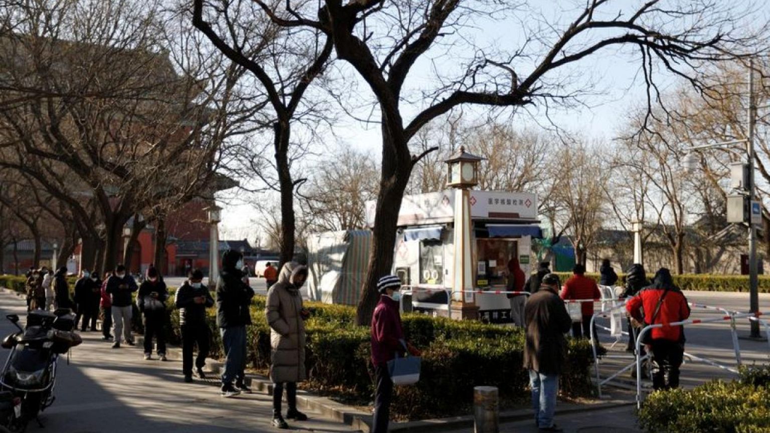 Beijing drops COVID testing burden as wider easing beckons