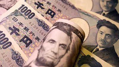 Yen eases as traders digest BOJ surprise policy tweak