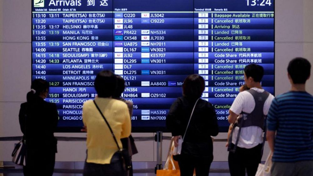 Japan says 8.3% of passengers from China had COVID on arrival last week