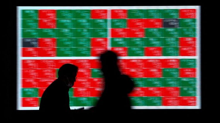 Asia shares dip on hawkish Fed remarks; commods rise on China reopening