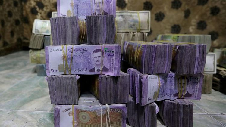 سوريا تخفض سعر الصرف الرسمي لعملتها الليرة