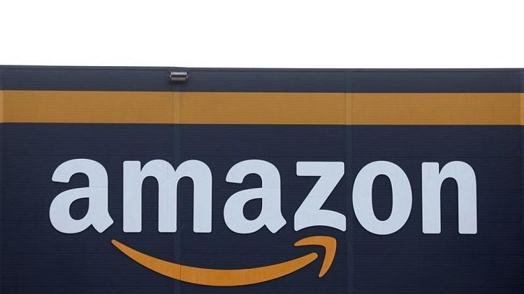 AMAZON-COM-RESULTADOS:Amazon supera estimaciones de ventas trimestrales por atractivas ofertas de fin de año