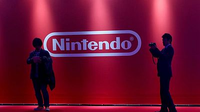 NINTENDO-RESULTS:Nintendo trims annual profit outlook on firmer yen