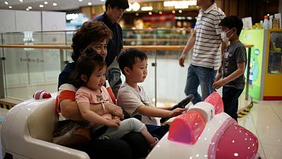 Make it easier to raise children, say many Chinese after population falls