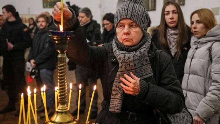 UKRAINE-CRISIS-BRITON-MEMORIAL:Tearful mourners remember British volunteer killed in eastern Ukraine