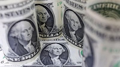 GLOBAL-FOREX:Dollar cautiously firm ahead of busy central bank week
