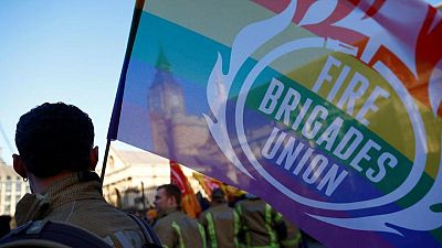 BRITAIN-COURT-PENSIONS:UK passing $23 billion pension reform bill to workers, unions tell London court
