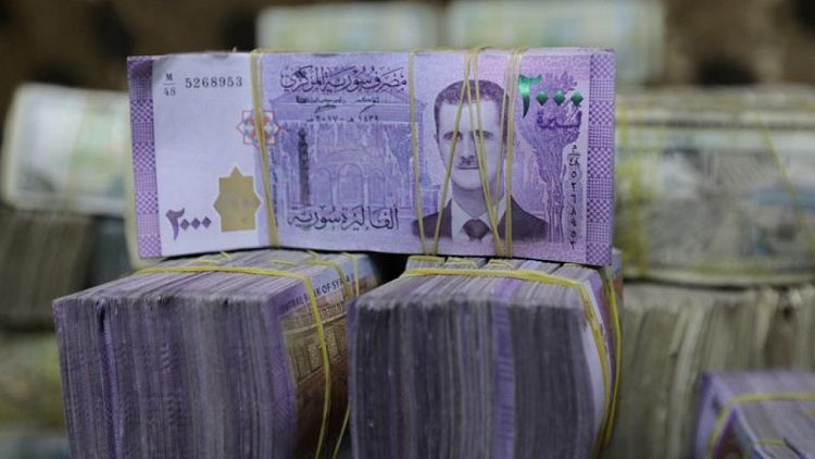 SYRIA-POUND-DEPRECIATION-NI6:بيان: مصرف سوريا المركزي يخفض قيمة الليرة أمام الدولار إلى 6650