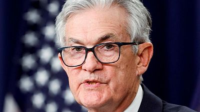 USA-FED-RATECUTS:Fed's Powell says no rate cuts this year, and markets hear it differently