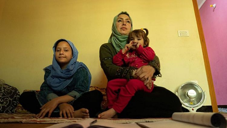 AFGHAN-WOMEN-EA6:أفغانيات من ممثلات للادعاء العام ورموز للديمقراطية إلى لاجئات في إسبانيا
