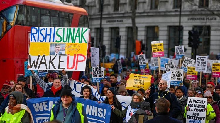 BRITAIN-STRIKES:Britain faces largest ever healthcare strikes as pay disputes drag on