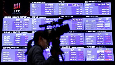 GLOBAL-MARKETS:Asia shares skid, dollar gains as yields spike