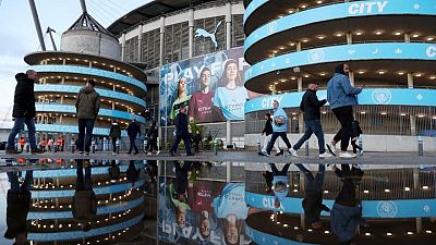 SOCCER-ENGLAND-MCI-FINANCES:Soccer-Man City charged by Premier League over alleged financial rule breaches