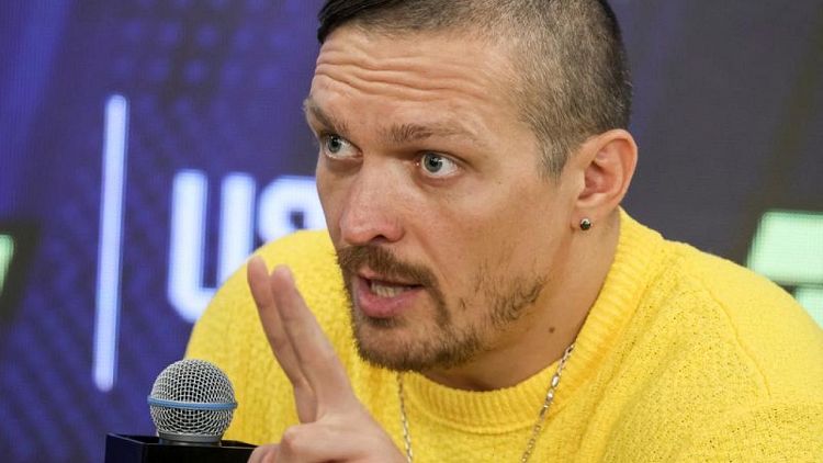 UKRAINE-CRISIS-USYK-OLYMPICS:Olympics-Russians will win 'medals of blood' if allowed to compete, says Ukraine's Usyk
