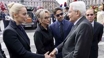 È una deputata ed è la compagna di vita di Berlusconi